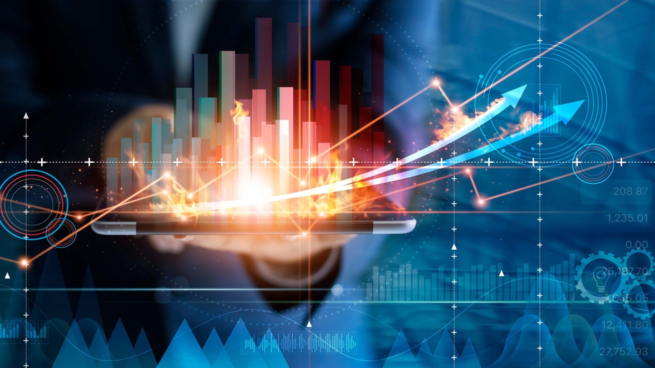 Hot business growth. Businessman using tablet analyzing sales data and economic growth graph chart. Business strategy, financial and banking. Digital marketing.